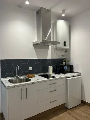 Una cocina o zona de cocina en Apartamentos Casa el Gorras