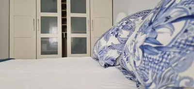 Cama o camas de una habitación en Piso familiar y con encanto