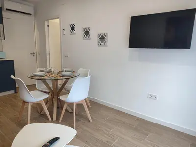Una televisión o centro de entretenimiento en Apartamento Inés y Manolo