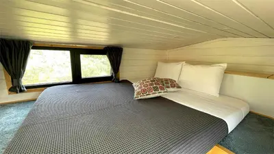 Cama o camas de una habitación en La Vista Huma by Tiny Away