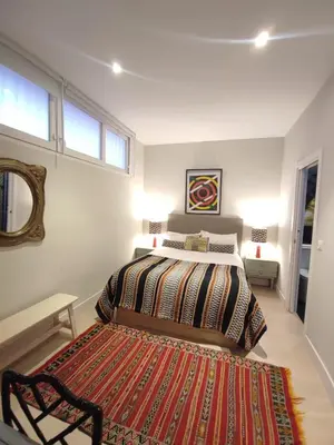 Cama o camas de una habitación en El Alcazar