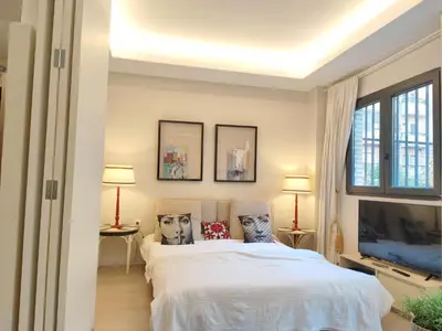 Cama o camas de una habitación en El Alcazar