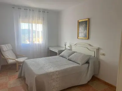 Cama o camas de una habitación en Apartamento El Mirador de Sierra Mágina Noalejo entre Granada y Jaén