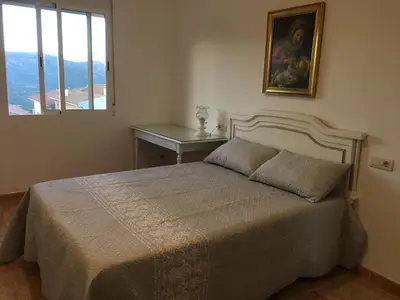 Cama o camas de una habitación en Apartamento El Mirador de Sierra Mágina Noalejo entre Granada y Jaén