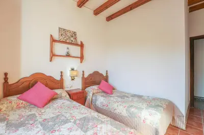 Cama o camas de una habitación en Casa rural Los Miradores
