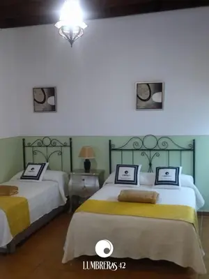 Cama o camas de una habitación en Lumbreras 42 Apartamento, cerca de Isla Mágica y Estadio de la Cartuja