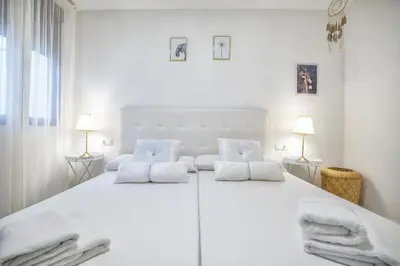 Cama o camas de una habitación en Encanto en la Judería: Apartamento con Patio