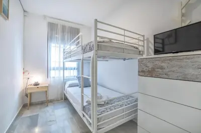 Cama o camas de una habitación en Encanto en la Judería: Apartamento con Patio