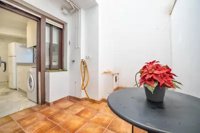 Una cocina o zona de cocina en Encanto en la Judería: Apartamento con Patio