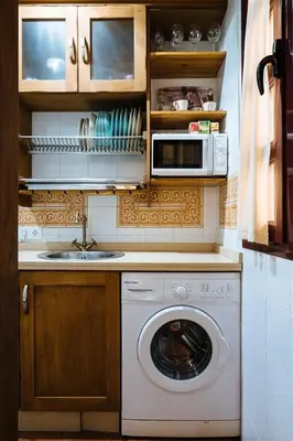 Una cocina o zona de cocina en Tranquilo apartamento en patio sevillano