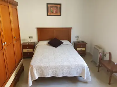 Cama o camas de una habitación en Casita la Herilla