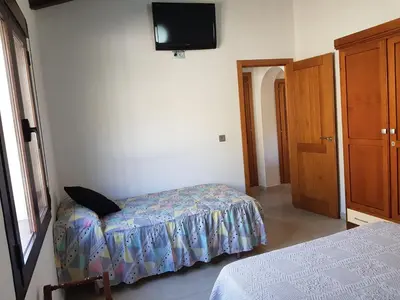 Cama o camas de una habitación en Casita la Herilla