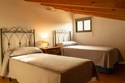 Cama o camas de una habitación en Casa Rural Mis Niñas
