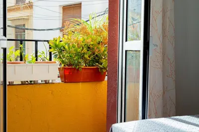 Un balcón o terraza de WISH SUITE ALAMEDA DE SEVILLA