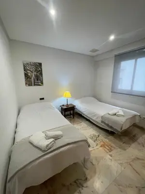 Cama o camas de una habitación en Apartamento Palmones