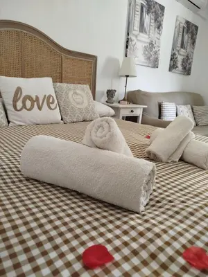 Cama o camas de una habitación en Casa Rural Rocío -Caminito del Rey
