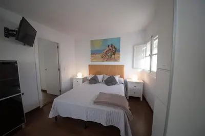 Cama o camas de una habitación en Apartment Seville Mirador Puerta Carmona
