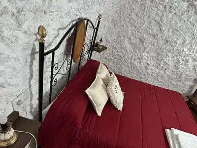 Cama o camas de una habitación en Casa/Cueva el Cigarrillo