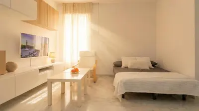 Cama o camas de una habitación en Spacious 2-Bedroom Apartment - Walk to Isla Mágica - AC - Premium Bed