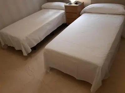 Cama o camas de una habitación en NUEVO-LUMINOSO Y MODERNO. Parking gratis!!