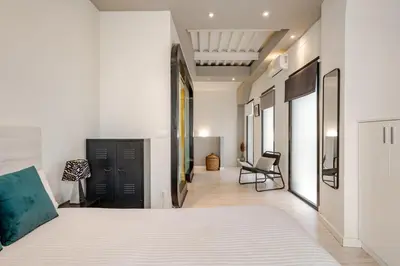 Cama o camas de una habitación en Dúplex el patio en centro de Sevilla