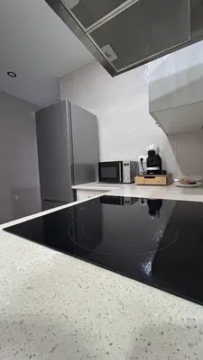 Una cocina o zona de cocina en Apartamentos la Catedral de Jaén