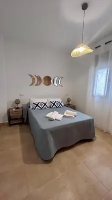Cama o camas de una habitación en Apartamentos la Catedral de Jaén