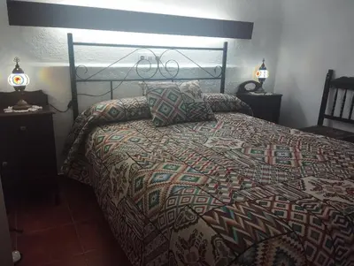 Cama o camas de una habitación en Alojamiento rural casa cueva abuelo Miguel
