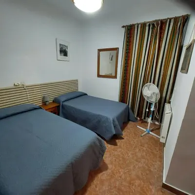 Cama o camas de una habitación en Casa Virginia entre mar y montaña