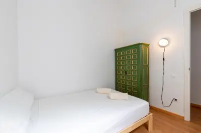 Cama o camas de una habitación en AoA Conde de Ibarra Apartment