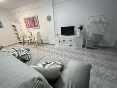 Una televisión o centro de entretenimiento en Apartamento céntrico San Miguel