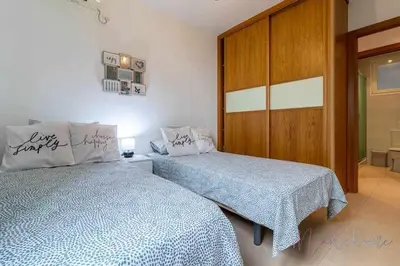 Cama o camas de una habitación en Apartamento 4 en Estadio Sevilla 8 plazas y metro