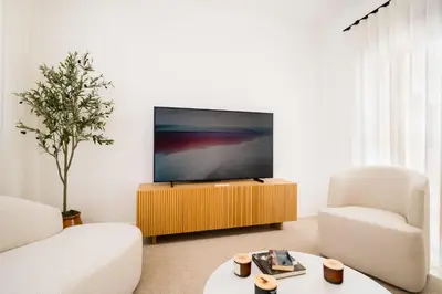 Una televisión o centro de entretenimiento en Stylish Duplex-3Beds 2Baths-Puerta Carmona Centro