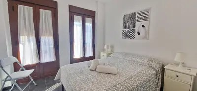 Cama o camas de una habitación en La casa de San fernando Mezquita