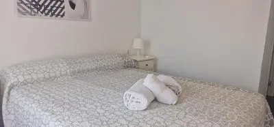 Cama o camas de una habitación en La casa de San fernando Mezquita