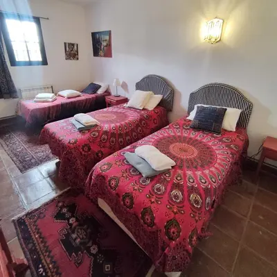 Cama o camas de una habitación en Cortijo el Cachete
