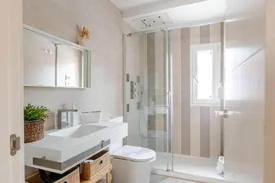 Un baño de Casa FIBES - Congresos parking y alberca