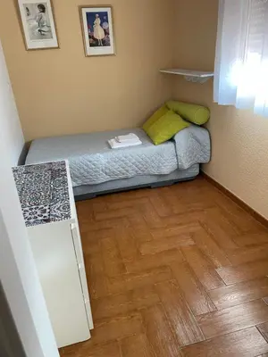 Cama o camas de una habitación en Familia anfitriona acoge
