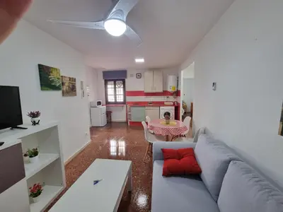 Una televisión o centro de entretenimiento en Vivienda Turistica en el Patio de la Judería