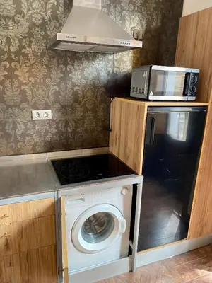Una cocina o zona de cocina en WISH SUITE LA FLORIDA DE SEVILLA