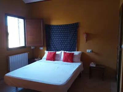 Cama o camas de una habitación en Casa Dehesa San Cristóbal, Jaén
