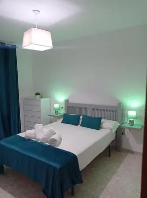 Cama o camas de una habitación en Apartamento La Reina Home