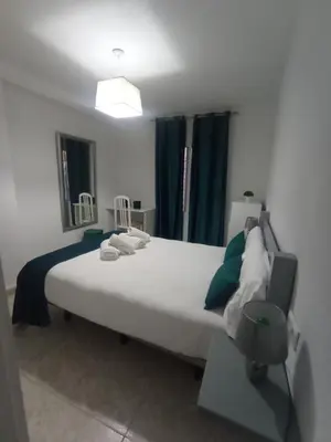 Cama o camas de una habitación en Apartamento La Reina Home