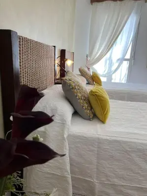 Cama o camas de una habitación en Casa Azalea - nuevo alojamiento en Setenil de las Bodegas