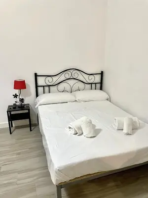 Cama o camas de una habitación en Alojamientos La Noria de la Albolafia