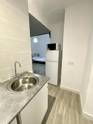 Una cocina o zona de cocina en Alojamientos La Noria de la Albolafia