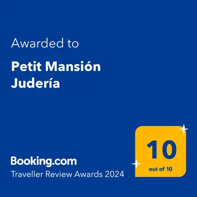 Certificado, premio, señal o documento que está expuesto en Petit Mansión JUDERÍA