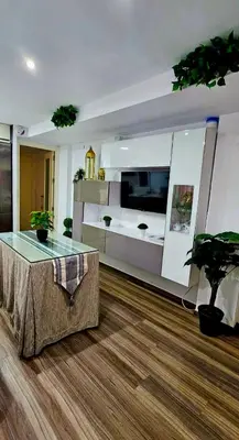 Una televisión o centro de entretenimiento en Petit Mansión JUDERÍA