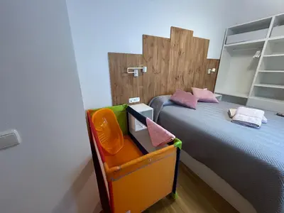 Cama o camas de una habitación en Apartamento Centro Azahar II