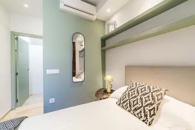 Cama o camas de una habitación en BS Brand New Triplex Private terrace downtown Parking